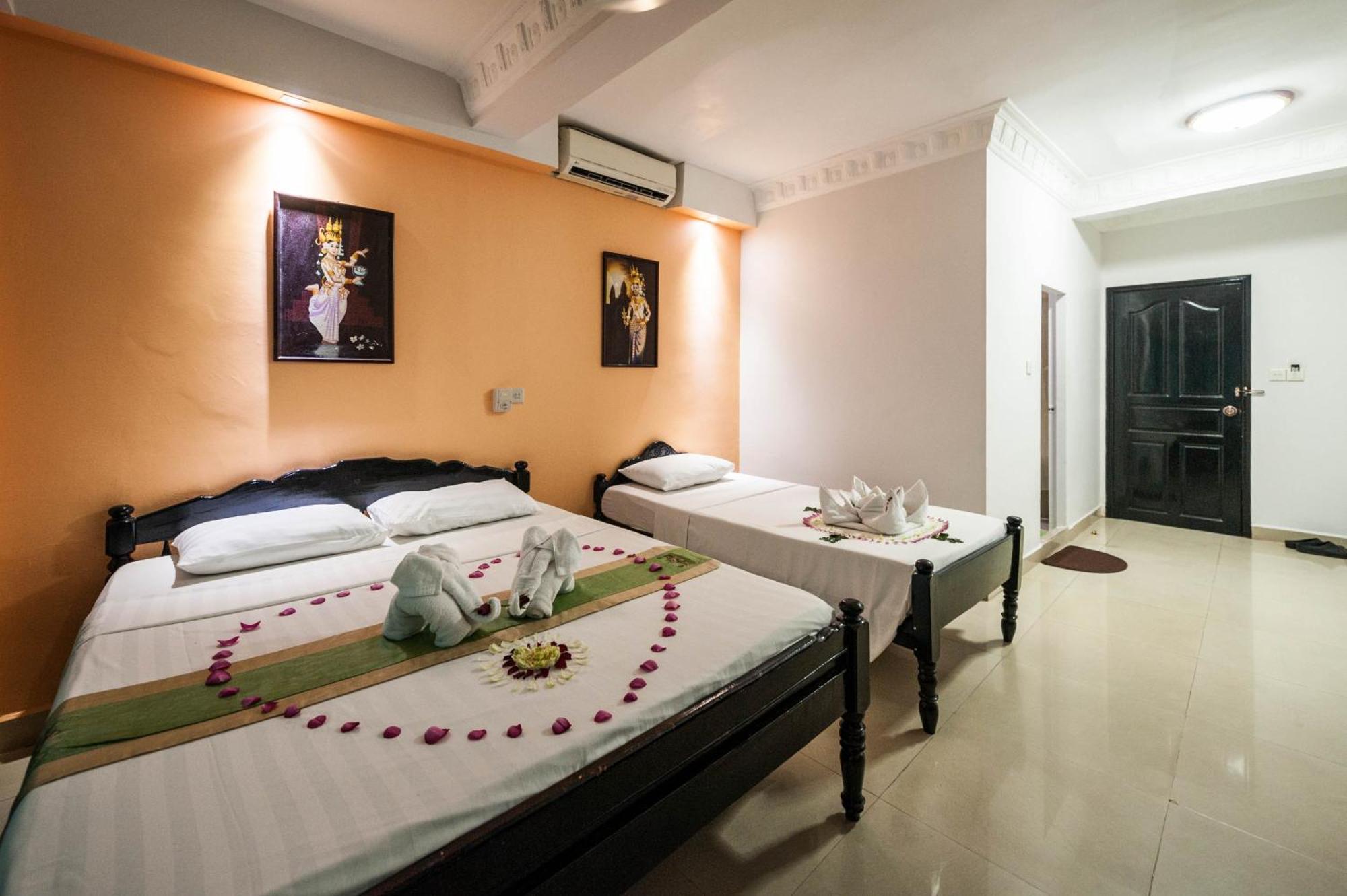 Angkor International Hotel Phnom Penh Habitación foto