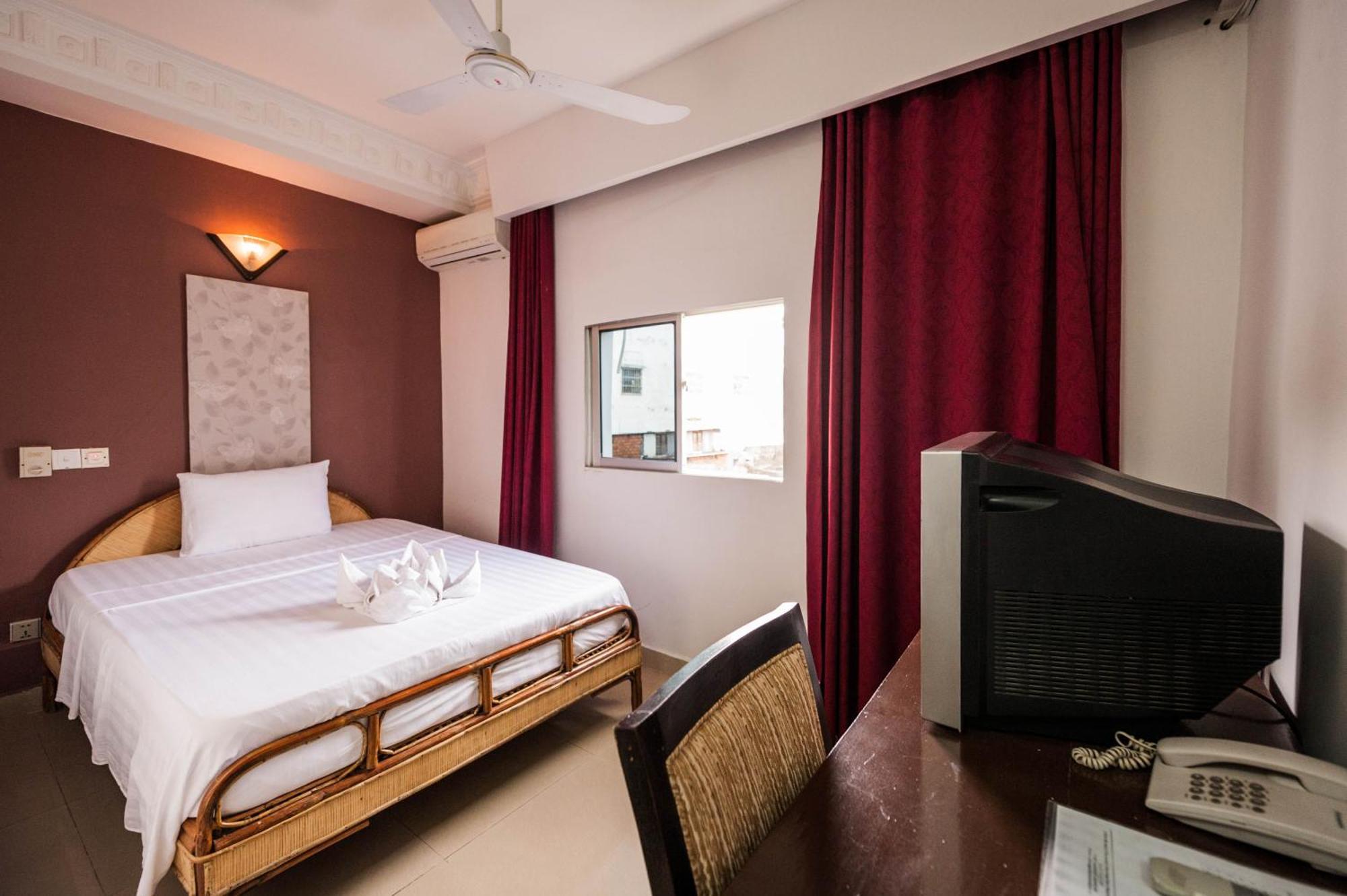 Angkor International Hotel Phnom Penh Habitación foto