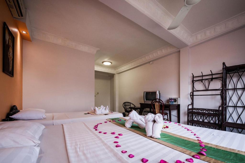 Angkor International Hotel Phnom Penh Habitación foto