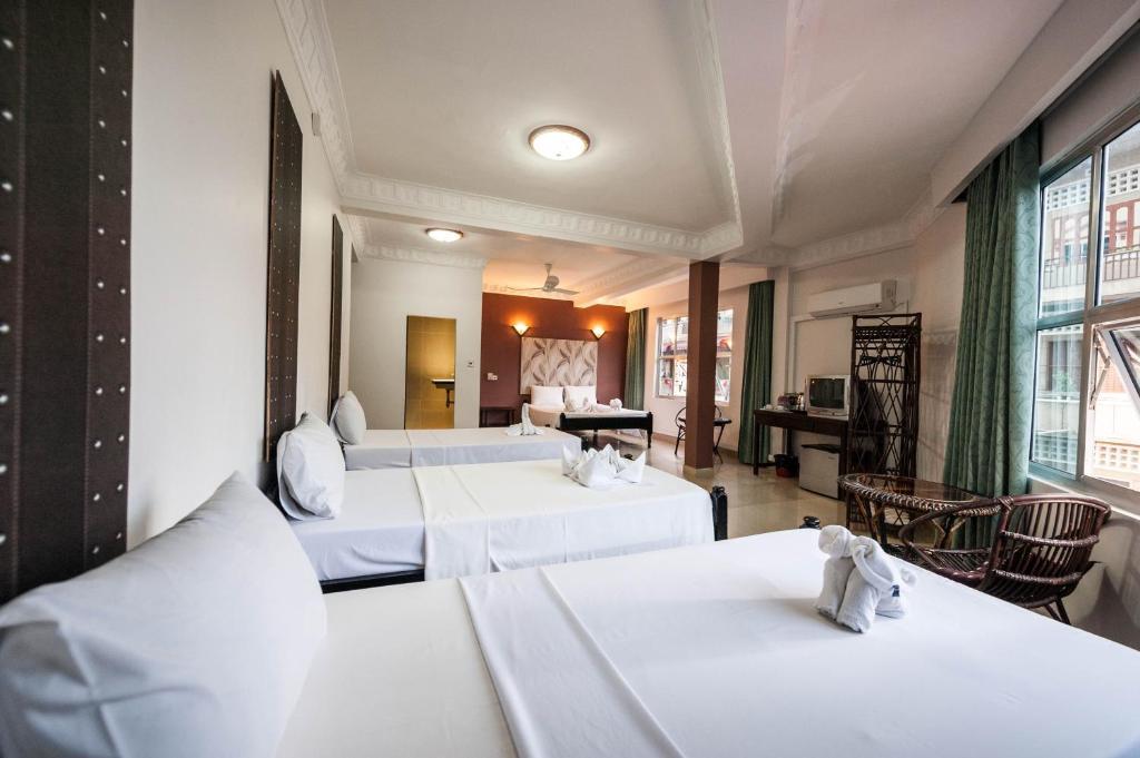 Angkor International Hotel Phnom Penh Habitación foto