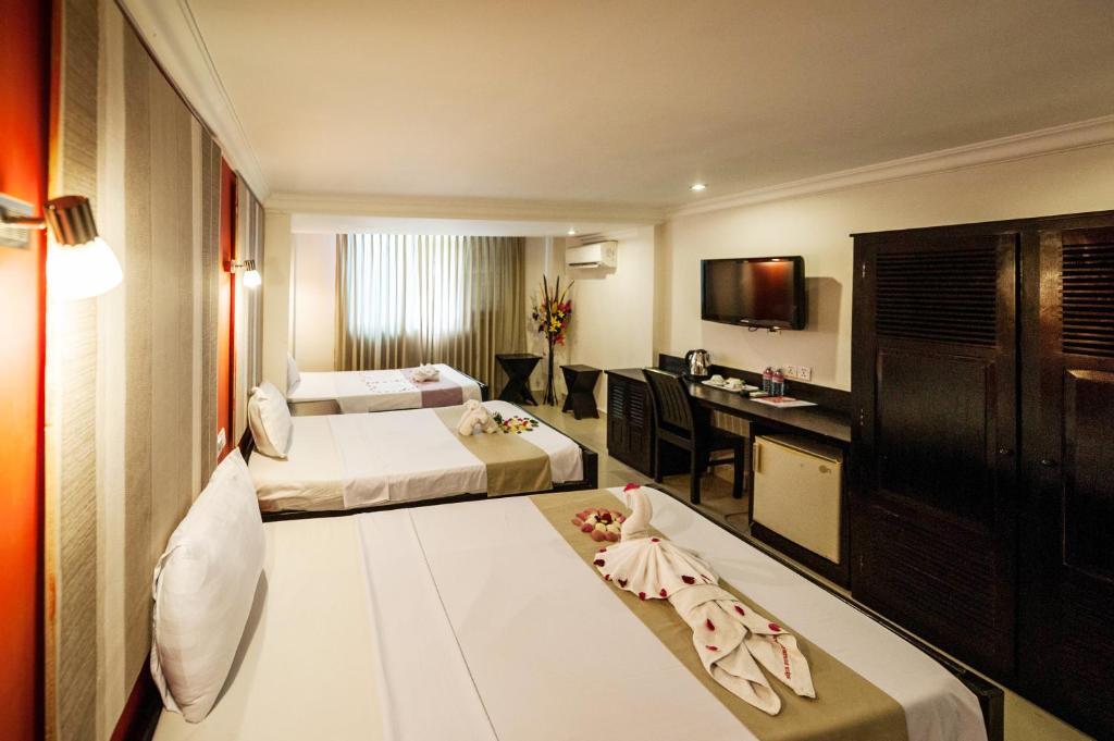 Angkor International Hotel Phnom Penh Habitación foto