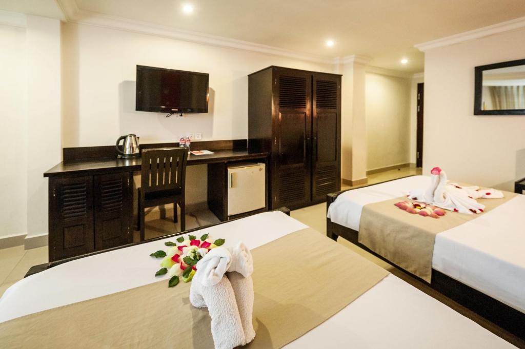Angkor International Hotel Phnom Penh Habitación foto