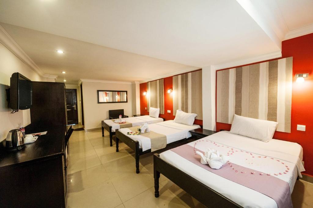 Angkor International Hotel Phnom Penh Habitación foto
